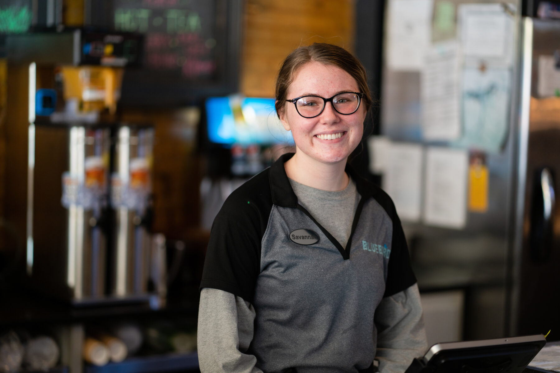 Bluebird server at the counter. Digital Marketing, Website Design, Branding, Graphic Design, Logo Design, Advertising, and Marketing Agency services in Danville, Kentucky.